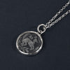 Long-tailed beastie rock crystal intaglio necklace