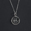 Long-tailed beastie rock crystal intaglio necklace