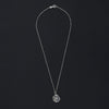 Long-tailed beastie rock crystal intaglio necklace