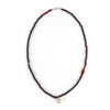 Garnet + pearl carved skull necklace