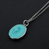 Turquoise cat intaglio necklace