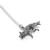 Candice Tripp’s silver fox pendant lying flat, textured and sculpted in mid-prowl.