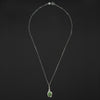 Field mouse intaglio necklace laid out full length on black, the bolt-ring clasp at the top and the mouse and its turquoise at the foot of the chain
