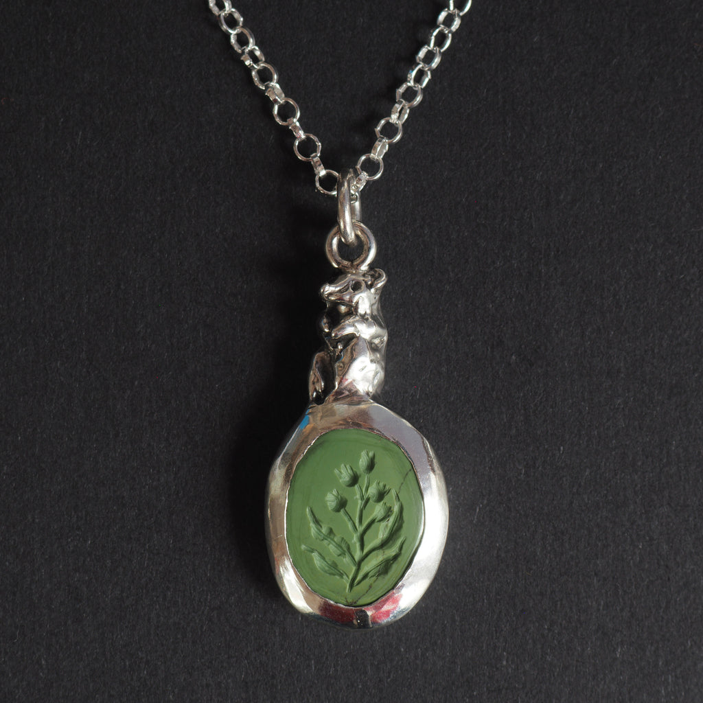 Field mouse intaglio necklace - a mouse necklace, a small silver mouse sculpted in the setting and perched above an olive-green turquoise carved with wild foliage