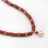 Red Jasper + Pink aventurine necklace with a skull pearl