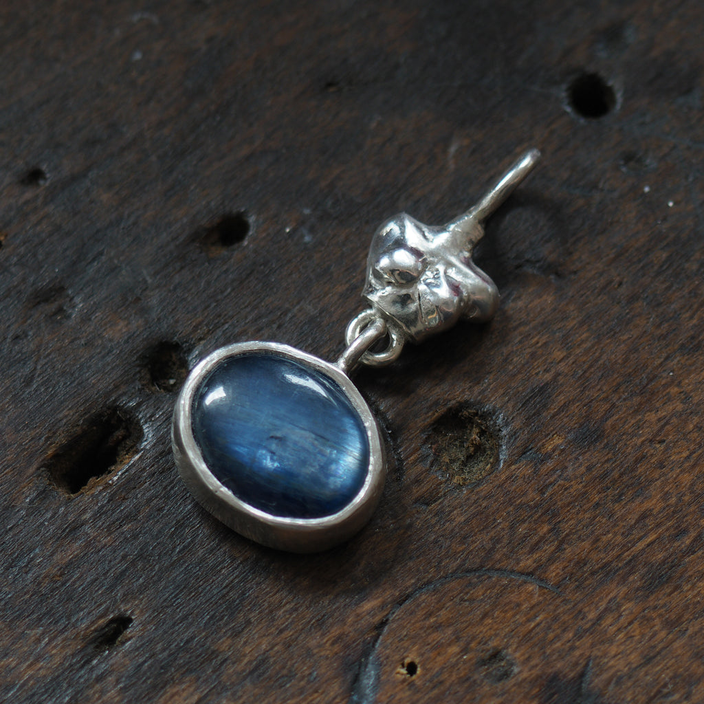 Kyanite and sterling silver chest charm