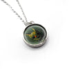 Red-nosed boy oil painting pendant