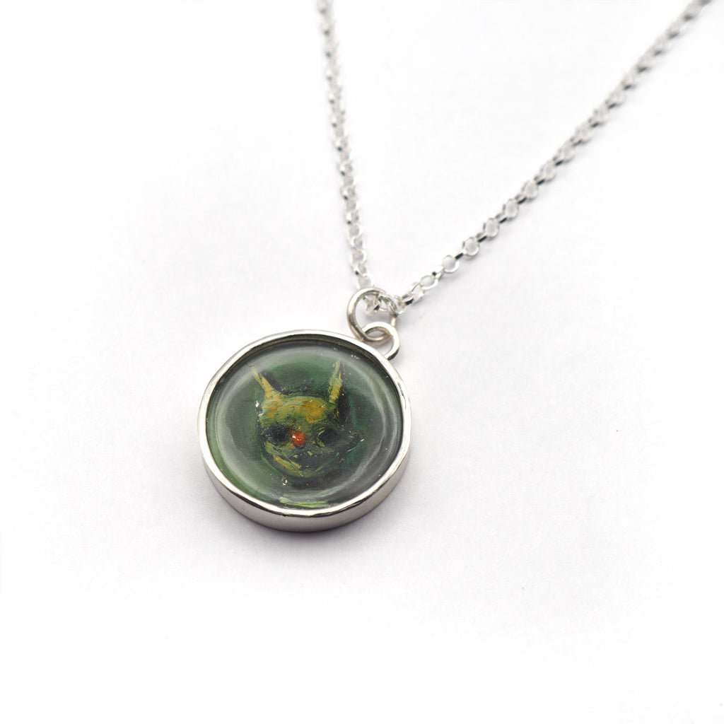 Red-nosed boy oil painting pendant