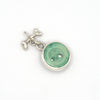 Hollow-eyed skull turquoise intaglio charm