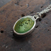Turquoise skeleton intaglio necklace