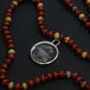 Sky Burial Vulture reverse intaglio necklace
